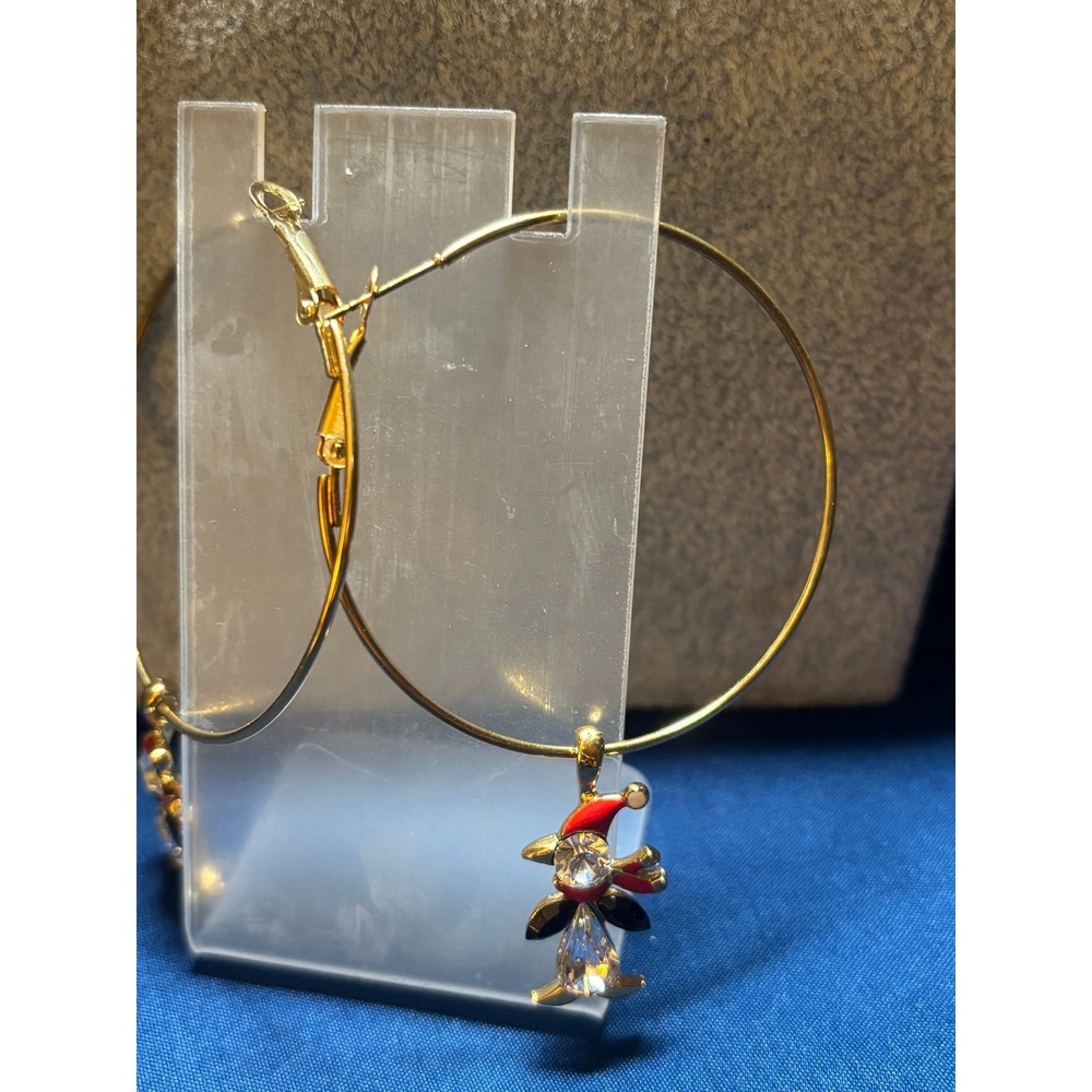 #28. Gold-tone Hoop Earrings with Christmas Charm